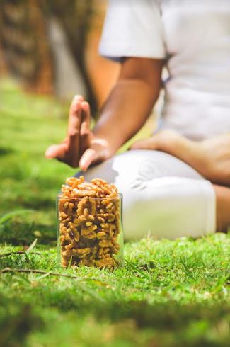 How Yoga & Walnuts May Enhance Heart Health